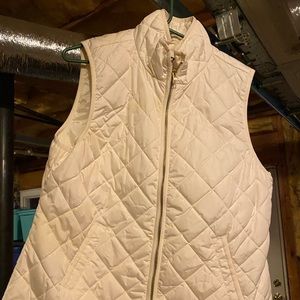 Old Navy white/cream puffy vest with gold zipper.